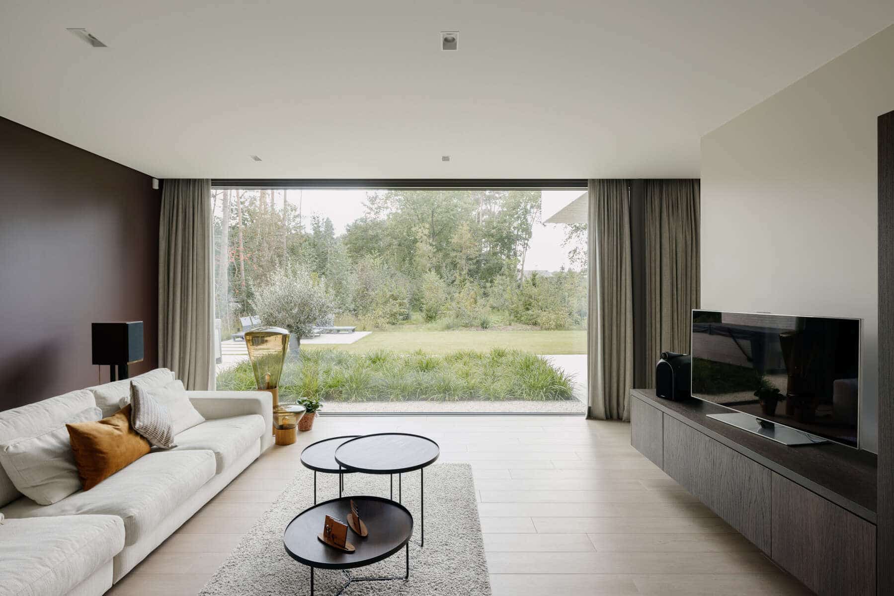 Seamless matte stretch ceiling in a modern living room